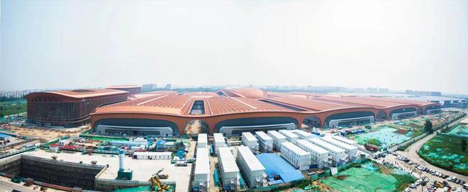 “紫金丝带”整体亮相 新国展二期金属屋面和幕墙工程完工(图1) “紫金丝带”整体亮相 新国展二期金属屋面和幕墙工程完工(图1)